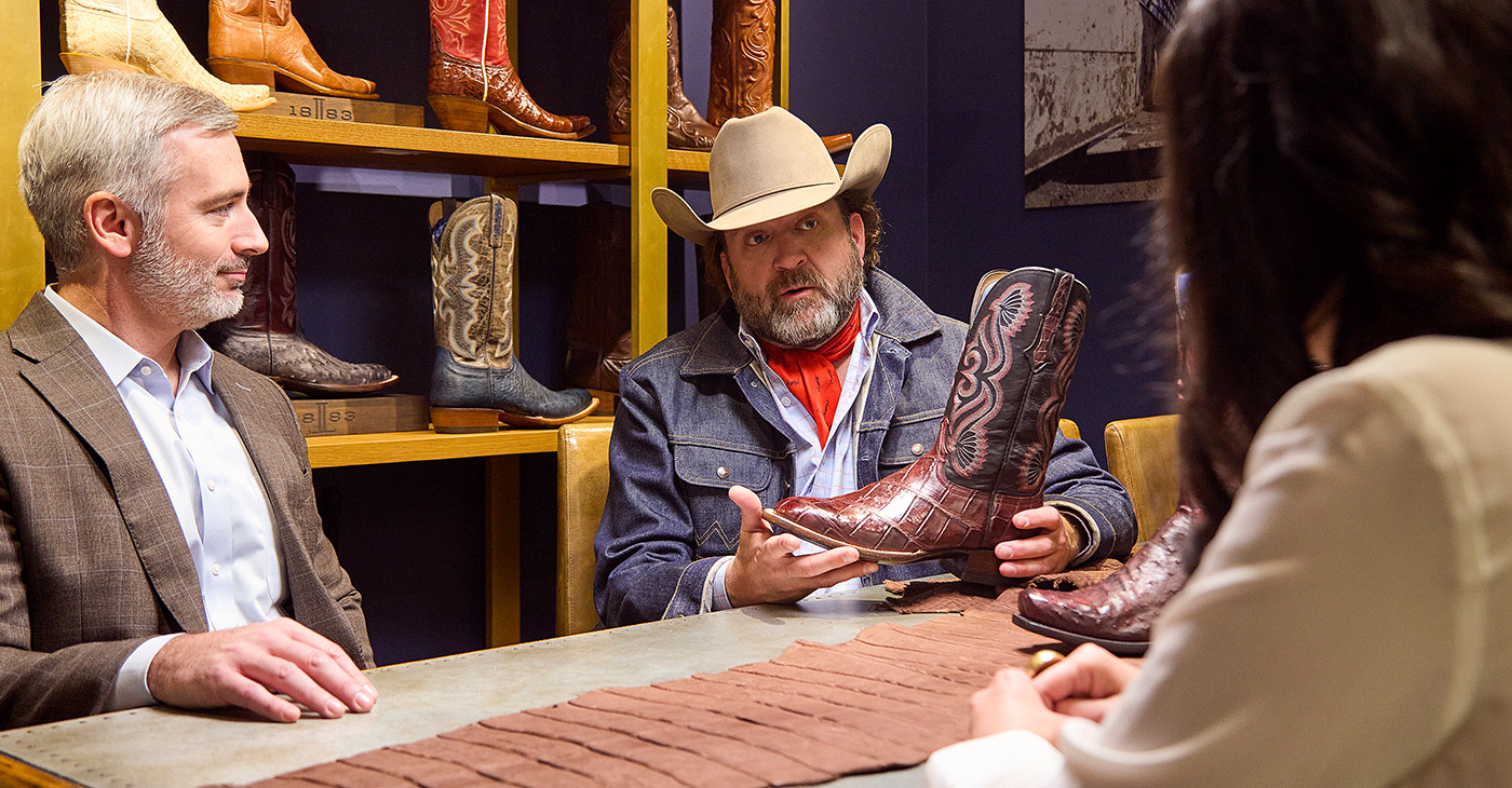 Lucchese members discussing boots