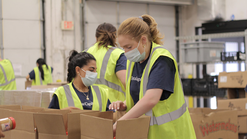Volunteers packing boxes