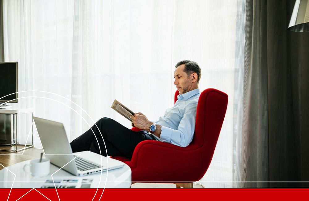 Man in red chair