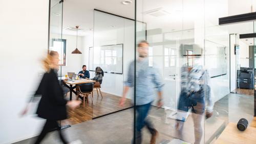 Capital Solutions People walking through office