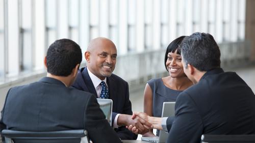 Mortgage Finance Business partners shaking hands