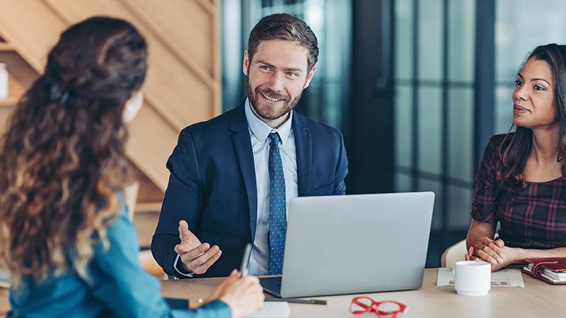 Grandparent Scams coworkers talking