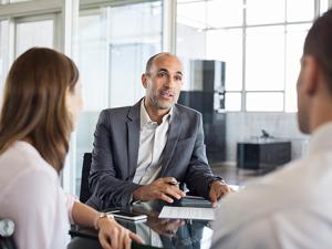 Texas Capital Securities business people talking