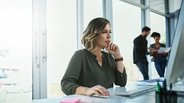 woman looking at computer