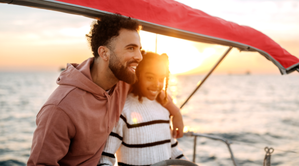 Father and daughter sailing together